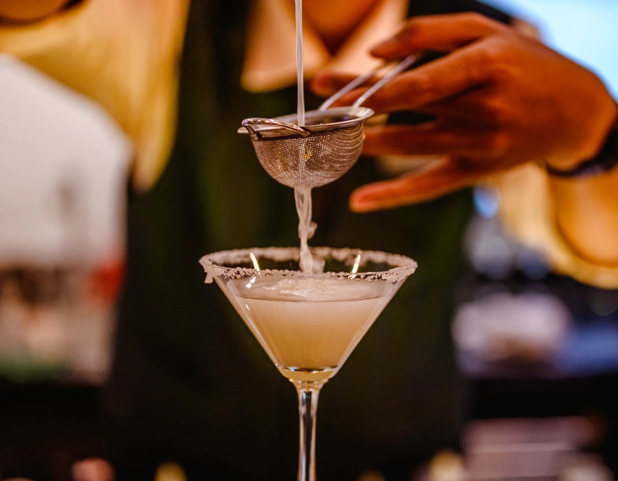 mixologist making gin cocktail