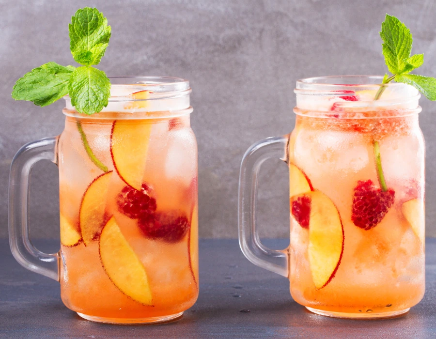 vodka soda with fresh fruit and mint
