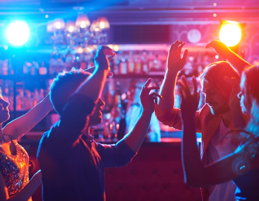 tipsy group of people dancing