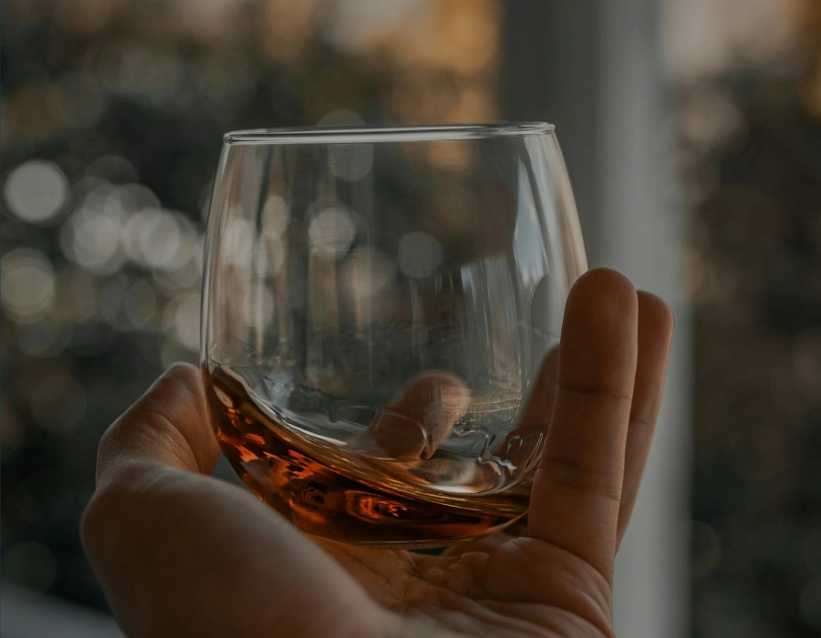 man with rye whiskey on ice