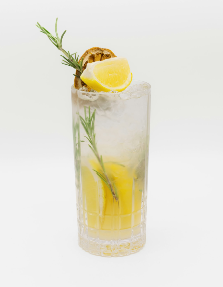 Tom Collins garnished with lemon and rosemary