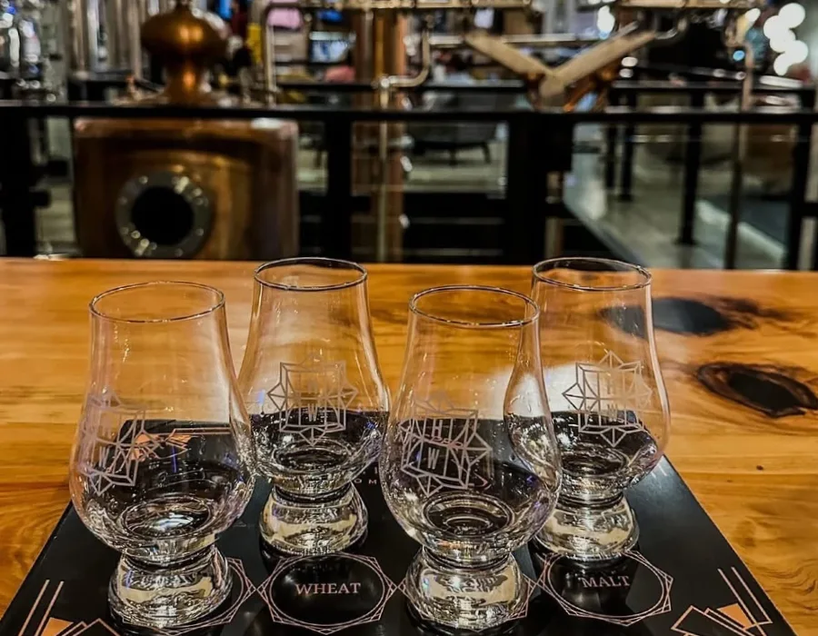 hush and whisper tasting glasses on bar