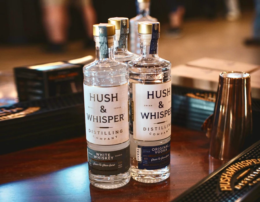 hush and whisper spirits on table