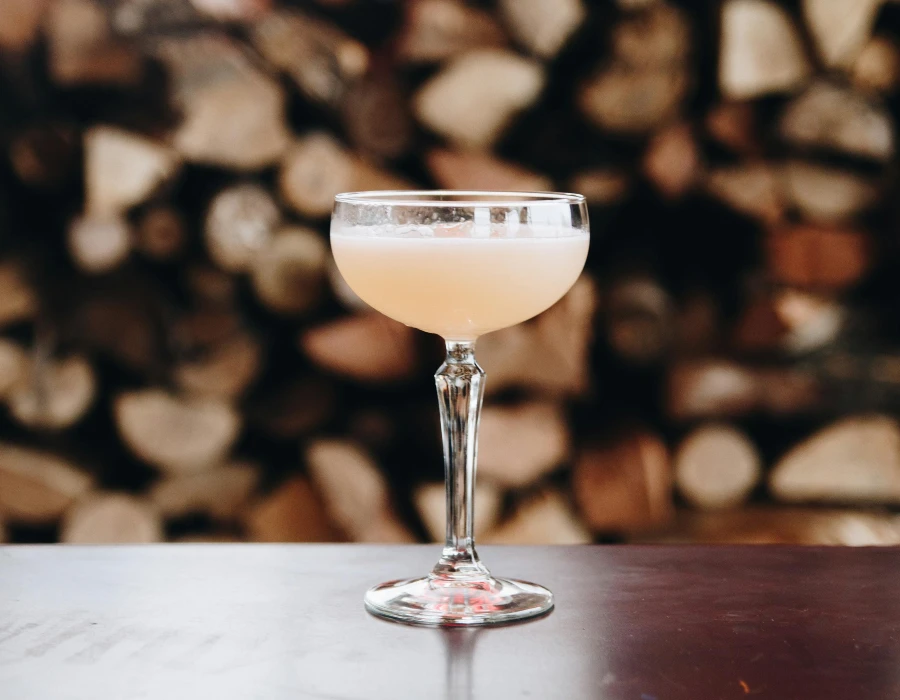 tequila with lemon peel at wine bar