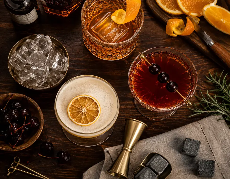 Elegant cocktail set on wooden table