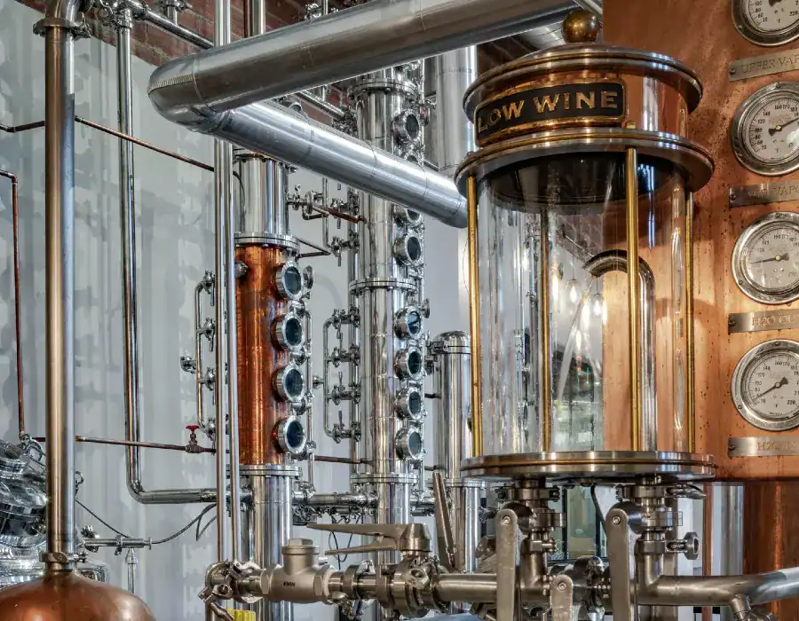 Copper and stainless steel distilling equipment at Hush and Whisper Distilling Co. in Bryan, Texas